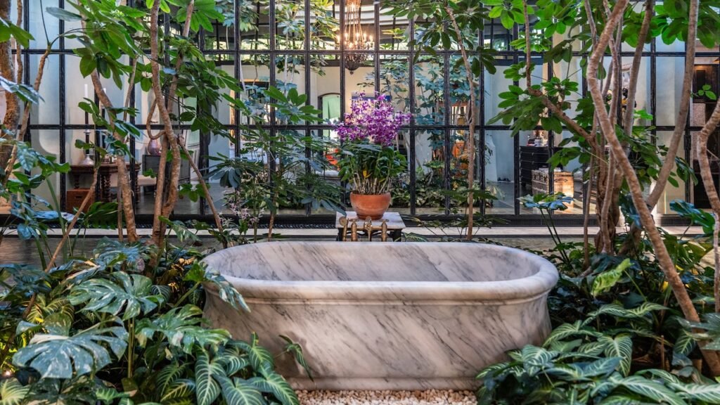 Legendary architect Bill Bensley has opened his wildly imaginative estate, Hacienda Botanica, for exclusive private stays — but only for the right people.