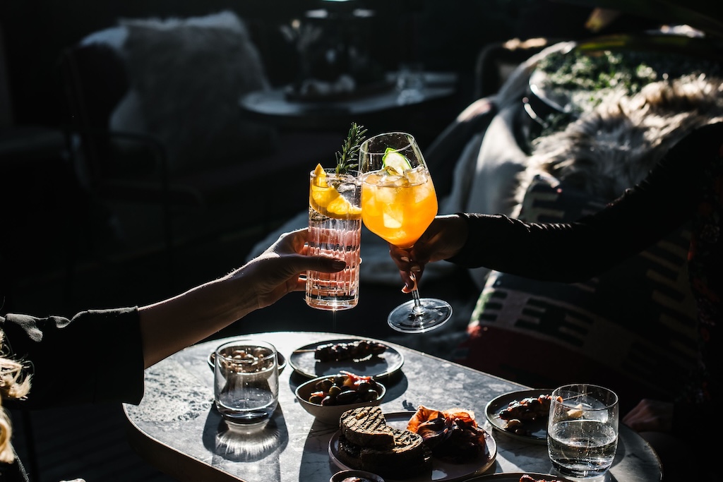 Sydney's cocktail scene runs from rooftop margaritas to hidden rum basements — here are the 10 bars worth building a night around.