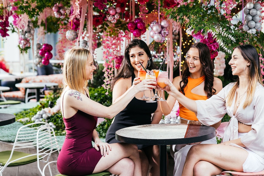 Sydney's cocktail scene runs from rooftop margaritas to hidden rum basements — here are the 10 bars worth building a night around.
