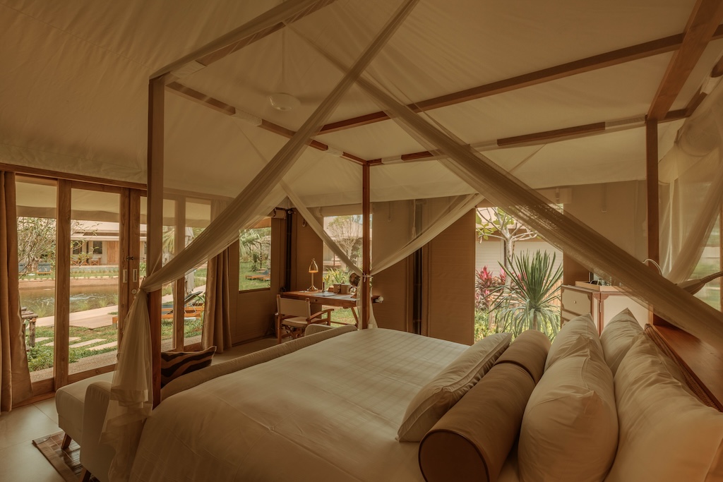 Steps from Bangtao Beach, Twinpalms Tented Camp Phuket blends safari-style canvas suites with barefoot luxury, delivering one of the island's most romantic, adults-only escapes.