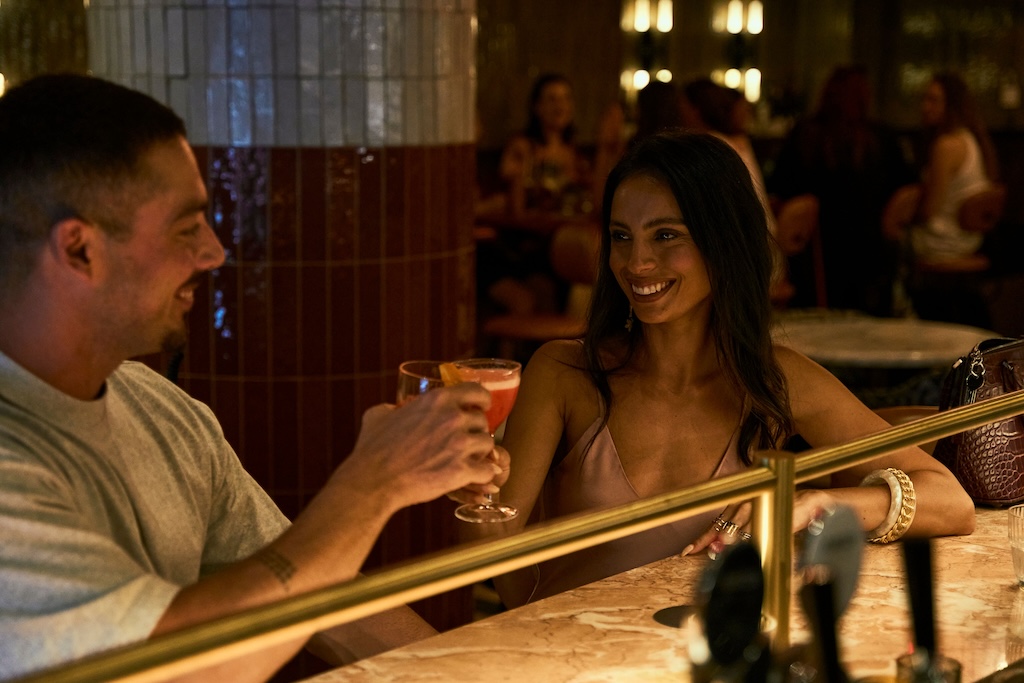 Sydney's cocktail scene runs from rooftop margaritas to hidden rum basements — here are the 10 bars worth building a night around.