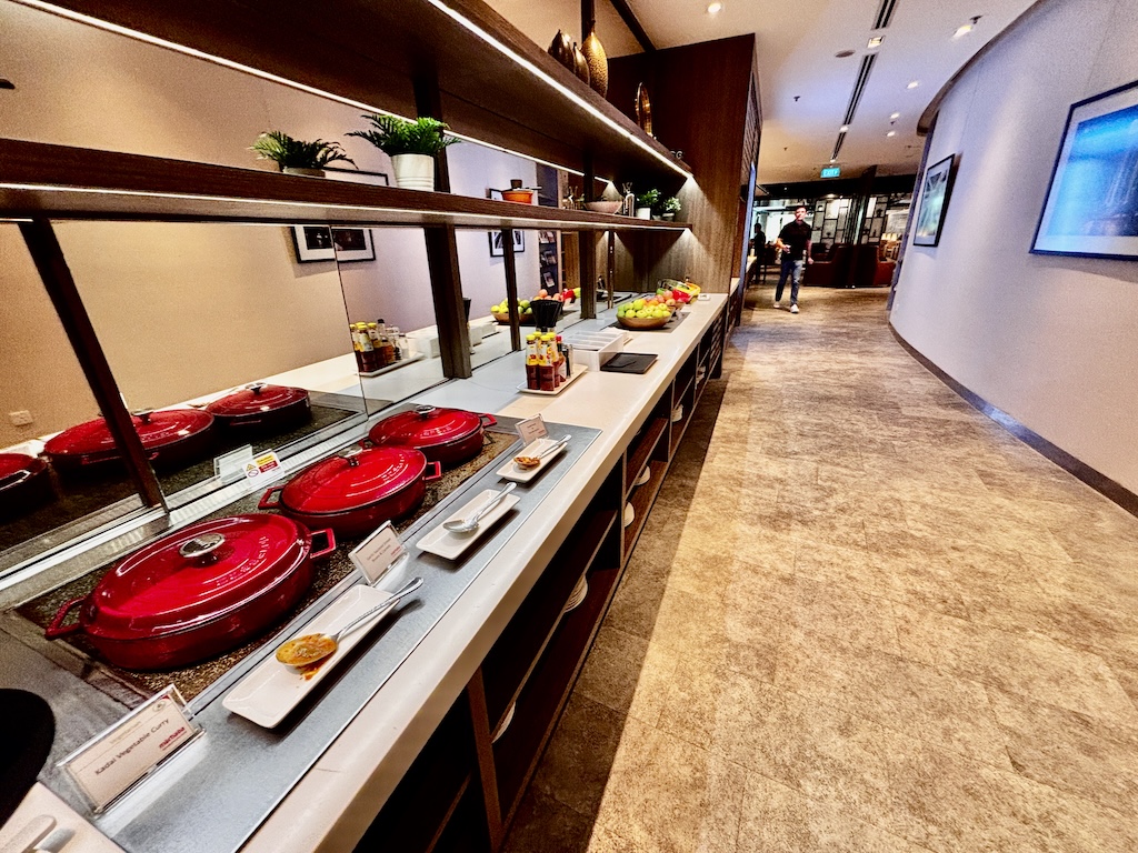 Tucked above the departure transit hall, Marhaba Lounge trades spectacle for comfort — a dependable, no-fuss stop before boarding at Changi's oldest terminal.