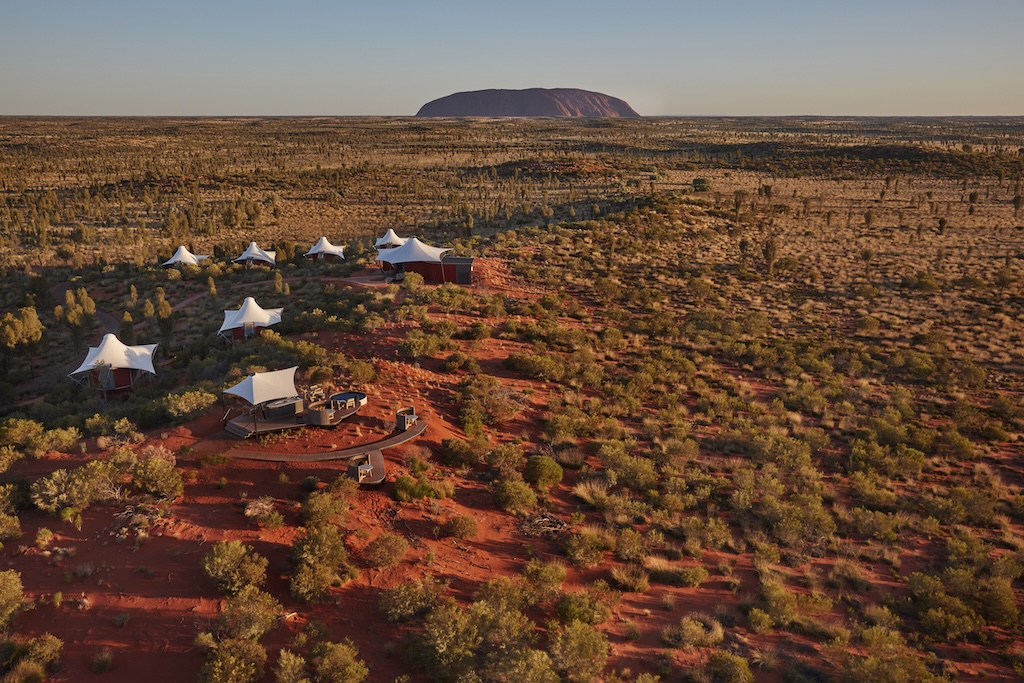 From a clifftop eyrie above the Southern Ocean to a tented camp on the edge of the Red Centre, Australia's finest luxury lodges offer something the world's grandest city hotels never can: the feeling of being genuinely, irreplaceably somewhere.