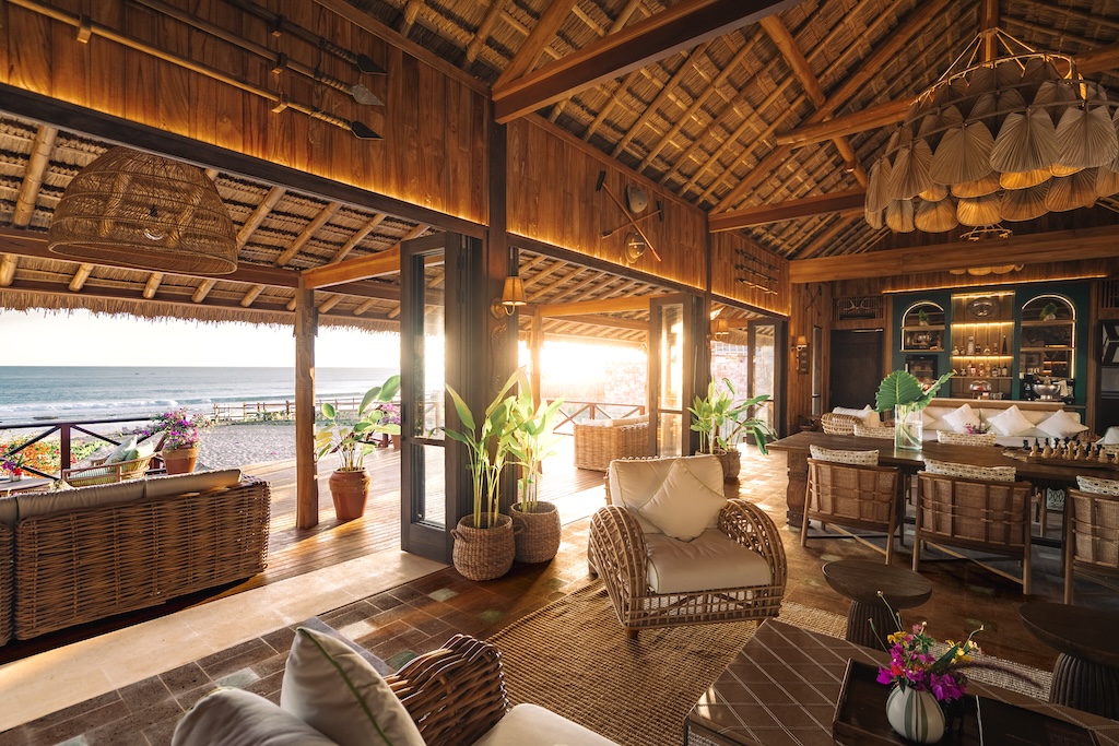 NIHI Sumba unveils the Riding and Racquet Club, a beachfront sanctuary blending equestrian tradition, sporting club nostalgia, and the island's untamed beauty, framed by horses.