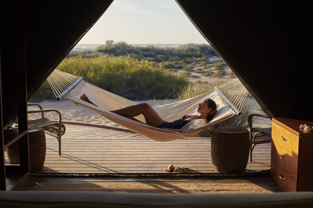 From a clifftop eyrie above the Southern Ocean to a tented camp on the edge of the Red Centre, Australia's finest luxury lodges offer something the world's grandest city hotels never can: the feeling of being genuinely, irreplaceably somewhere.