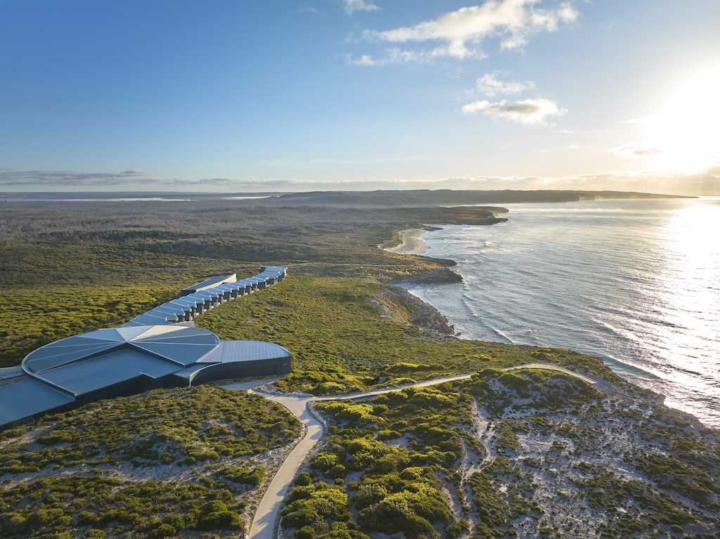 From a clifftop eyrie above the Southern Ocean to a tented camp on the edge of the Red Centre, Australia's finest luxury lodges offer something the world's grandest city hotels never can: the feeling of being genuinely, irreplaceably somewhere.