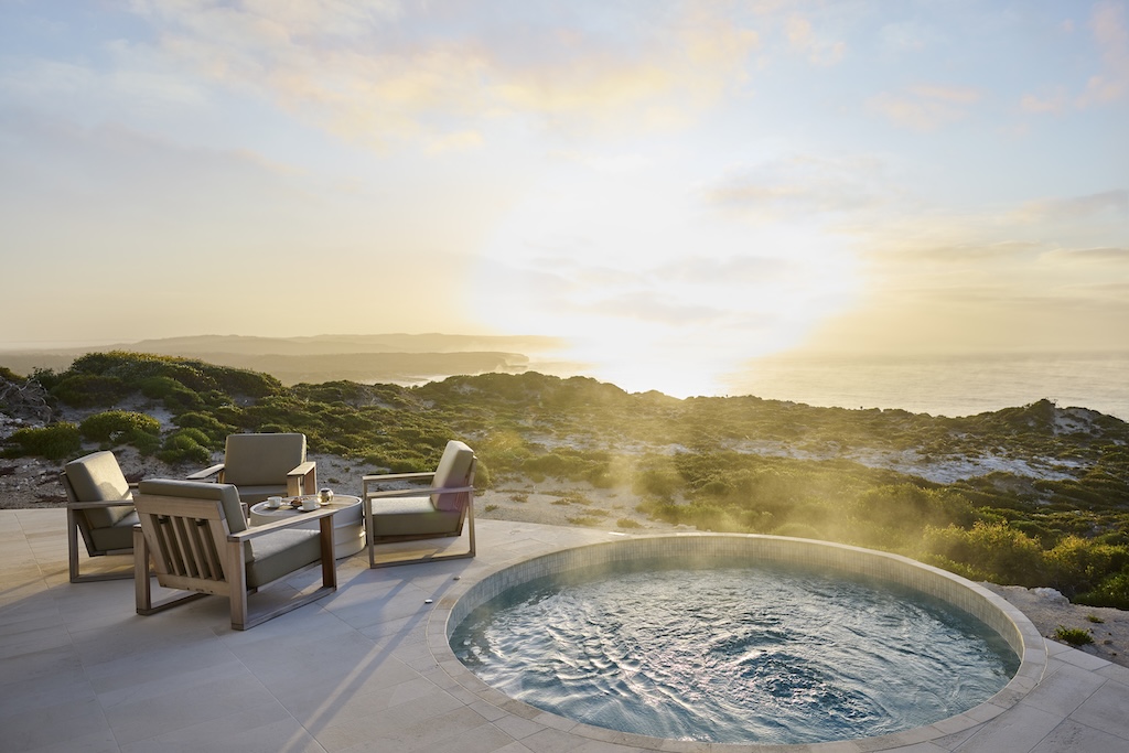 From a clifftop eyrie above the Southern Ocean to a tented camp on the edge of the Red Centre, Australia's finest luxury lodges offer something the world's grandest city hotels never can: the feeling of being genuinely, irreplaceably somewhere.