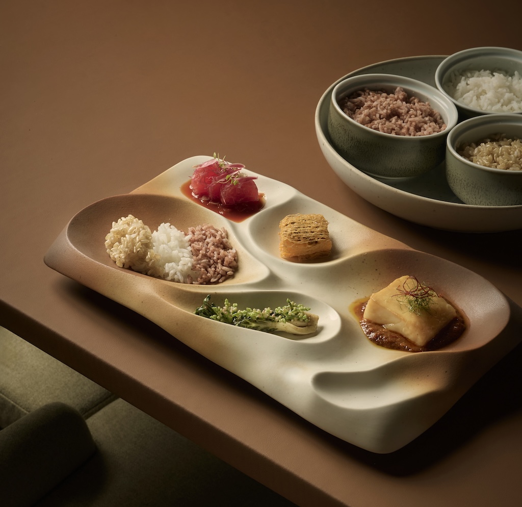 Chef Num Weerawat Triyasenawat unveils a reimagined Sra Bua at Siam Kempinski Hotel Bangkok this month, celebrating Thailand's biodiversity through visionary tasting menus.