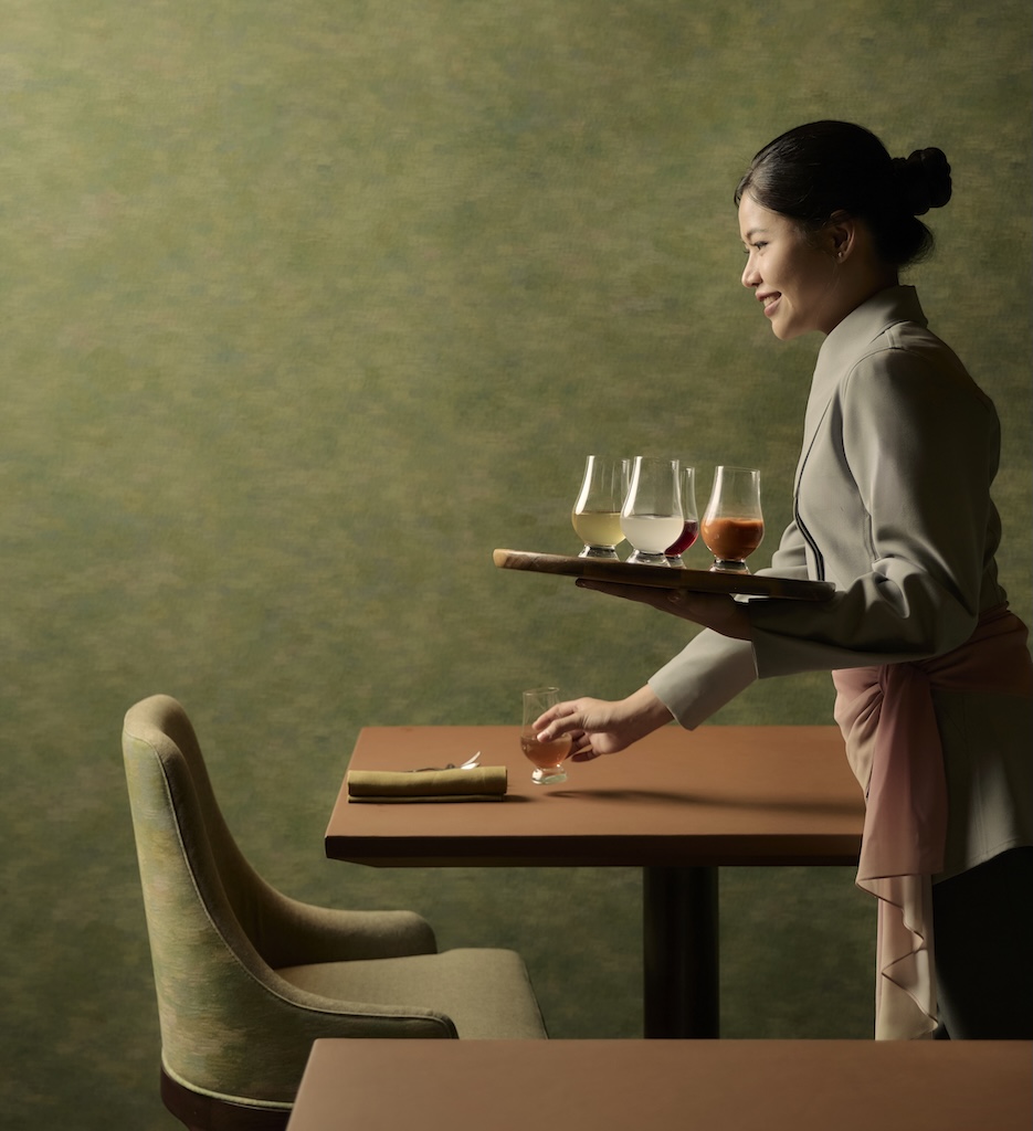 Chef Num Weerawat Triyasenawat unveils a reimagined Sra Bua at Siam Kempinski Hotel Bangkok this month, celebrating Thailand's biodiversity through visionary tasting menus.