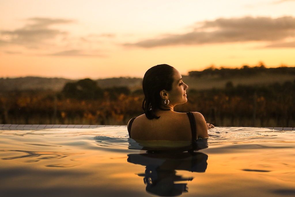 From a clifftop eyrie above the Southern Ocean to a tented camp on the edge of the Red Centre, Australia's finest luxury lodges offer something the world's grandest city hotels never can: the feeling of being genuinely, irreplaceably somewhere.