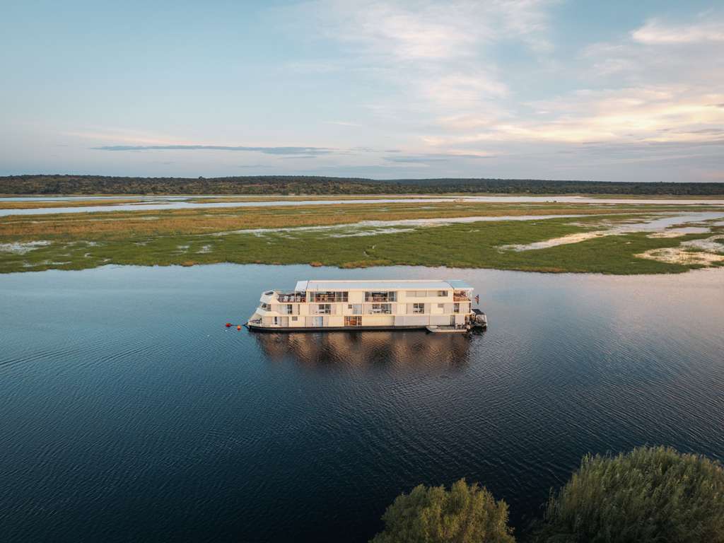 From the Zambezi Queen's floating boutique luxury to Lake Kariba's tiger-fishing houseboats, cruising the Chobe and Zambezi rivers offers Africa's wildlife at unforgettably close range.