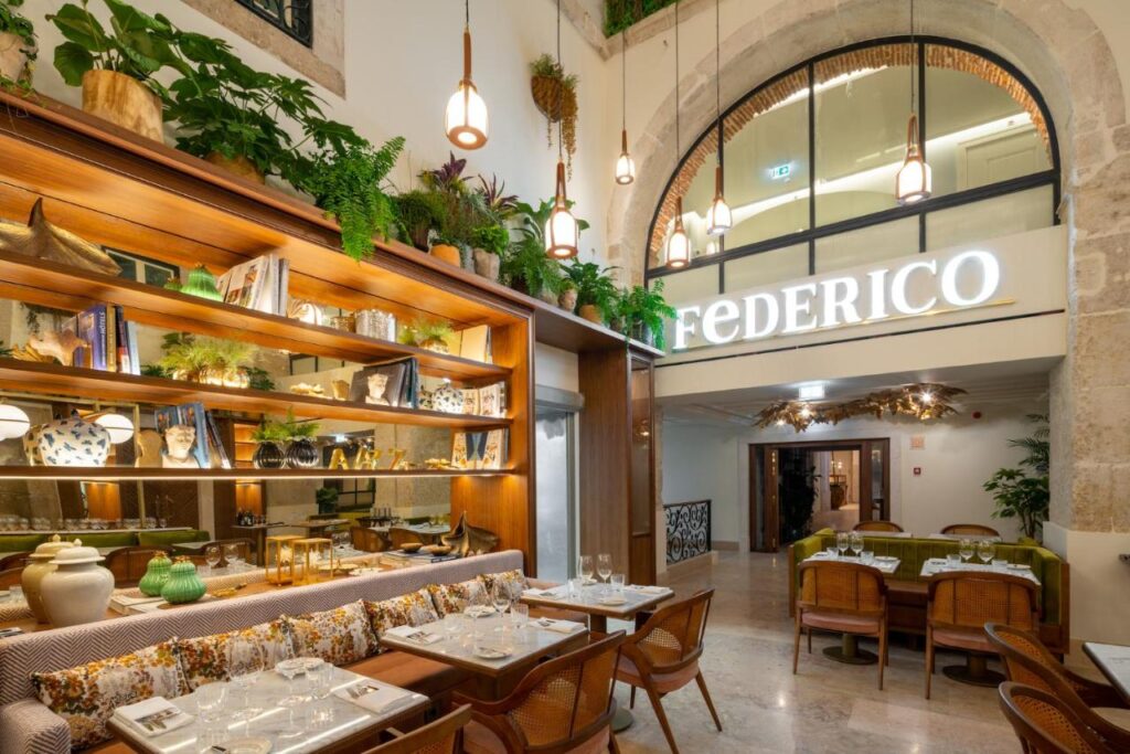 Set inside a restored 18th-century palace above Bairro Alto, Palácio Ludovice Wine Experience Hotel pairs Lisbon's deepest wine heritage with quietly luxurious boutique hospitality.