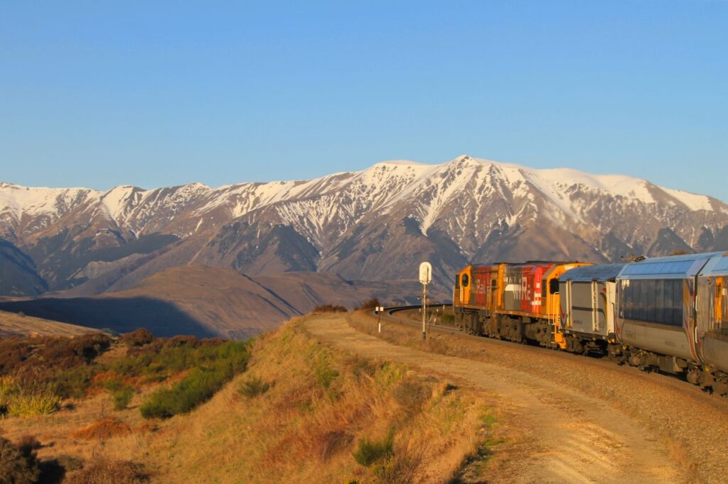 The TranzAlpine train, which passes through and below the mountain ranges of New Zealand's South Island, remains one of the world's most iconic rail journeys.