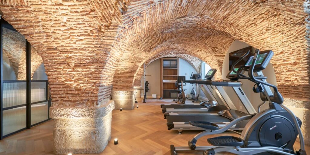 Set inside a restored 18th-century palace above Bairro Alto, Palácio Ludovice Wine Experience Hotel pairs Lisbon's deepest wine heritage with quietly luxurious boutique hospitality.