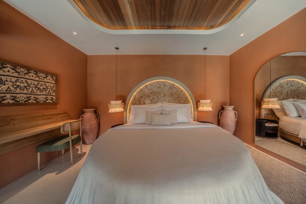 With just ten private pool villas, Ajowa Resort & Spa Seminyak swaps Bali's grand gestures for sculpted terracotta, quiet gardens and grounded luxury.
