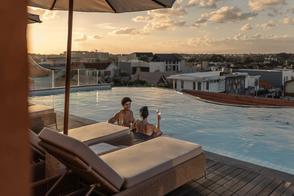 With just ten private pool villas, Ajowa Resort & Spa Seminyak swaps Bali's grand gestures for sculpted terracotta, quiet gardens and grounded luxury.