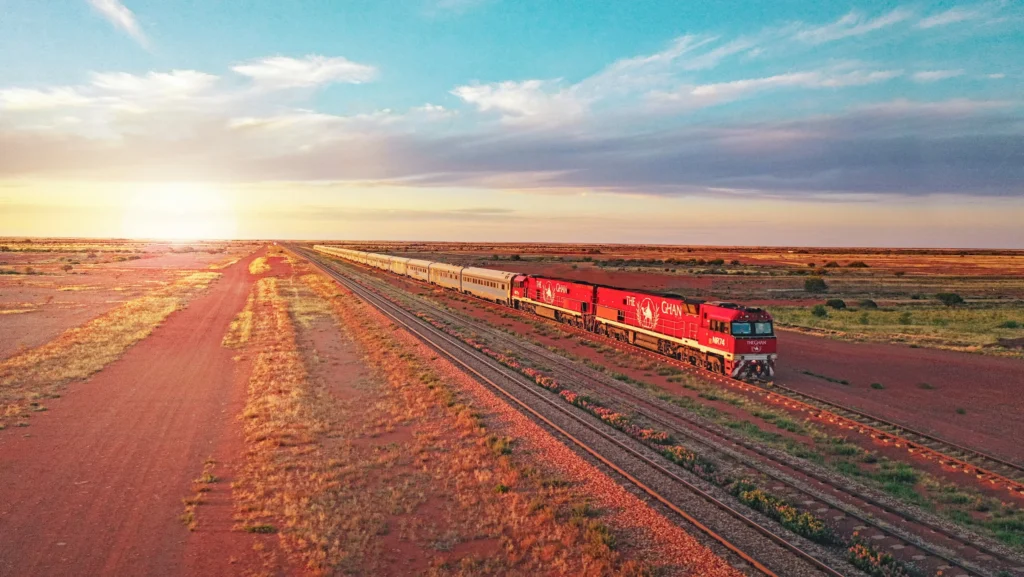 From Art Deco carriages crossing Europe to a floating-island train through the Andes and Australia's outback icons, ten trains prove the journey matters more.