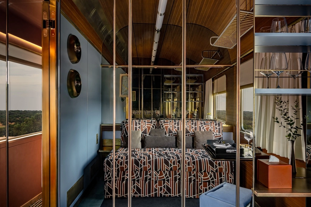Deluxe cabin aboard La Dolce Vita Orient Express with walnut panelling