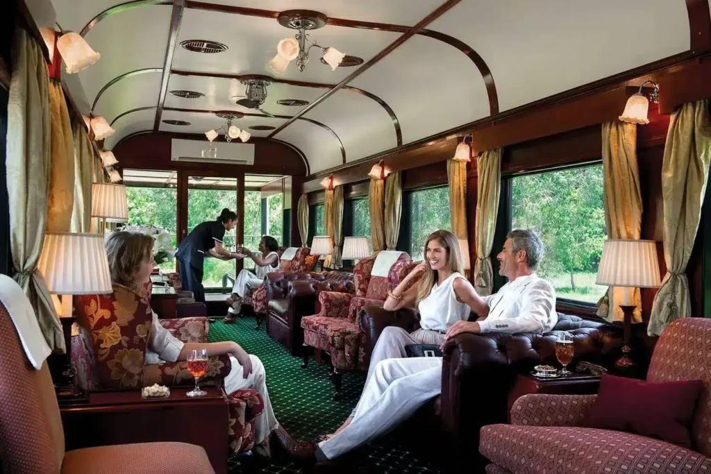 Guests in evening dress aboard Rovos Rail’s Pride of Africa