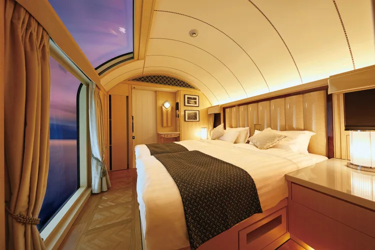 From Art Deco carriages crossing Europe to a floating-island train through the Andes and Australia's outback icons, ten trains prove the journey matters more.